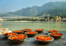Puja flowers offering at the bank of Ganges river in Rishikesh