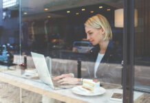 student in cafe belfast